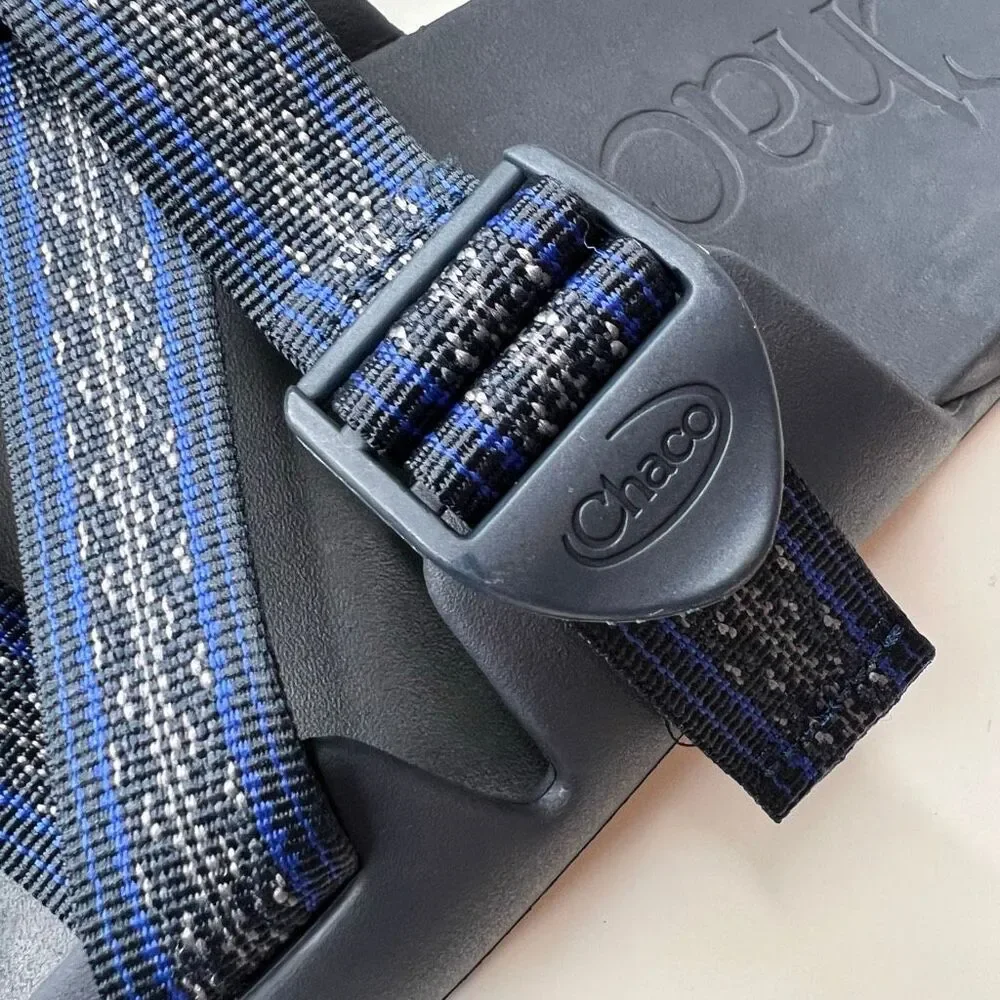 Chaco Men's Chillos slides feature blue and gray patterned adjustable straps and